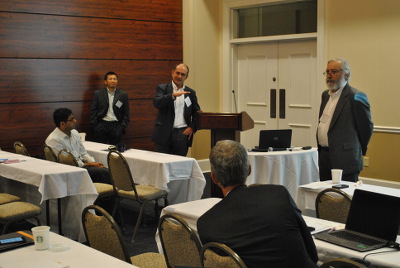 Dr. Lei Cao and Dr. Alexander Yakovlev answer questions during a session moderated by Dr. John Daigle